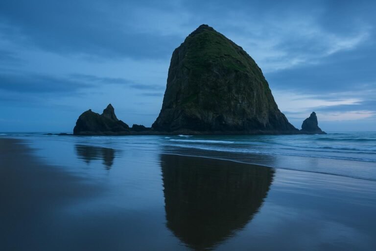 Cannon Beach Oregon wallpaper with Haystack Rock and sandy beach